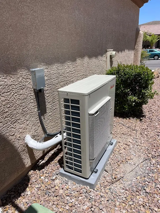 Residential air conditioning condenser unit in Rib Mountain